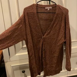 burnt-orange cardigan